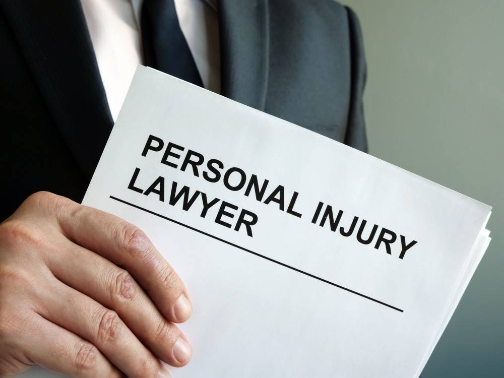 Personal,Injury,Lawyer,With,Clipboard,And,Law.